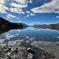 Glassy Lake in Glacier National Park by Chelsea Walk